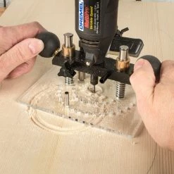 StewMac Rosette Router Base - StewMac -Strings + Accessories Shop 0703 3 with hands 3000px