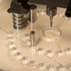 StewMac Rosette Router Base - StewMac -Strings + Accessories Shop 0703 4 pin in 2 hole 3000px