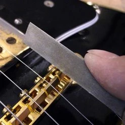 Gauged Nut Slotting Files - StewMac -Strings + Accessories Shop 0821 3 inuse saddle