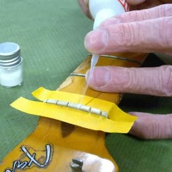 Nut Rescue Powder - StewMac -Strings + Accessories Shop 2348 4 in use 2 2000