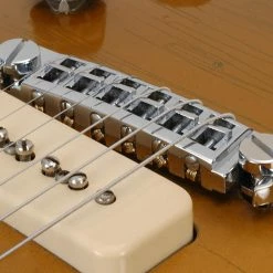 Pigtail Aluminum Wraparound Bridge - StewMac 6 Pigtail Aluminum Wraparound Bridge - StewMac -Strings + Accessories Shop 4507 3 in use 1600px