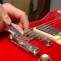 Tune-o-Medic Bridge And Tailpiece Tools - StewMac -Strings + Accessories Shop 4557 5 in use 2000px