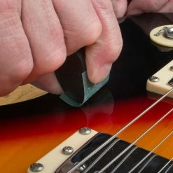 Kovax Tolecut Finish Repair System - StewMac -Strings + Accessories Shop 5733 5 inuse on archtop curve 2000