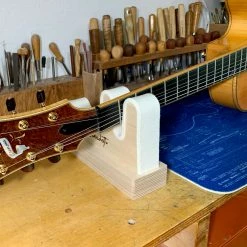 Benedetto Neck Rest - StewMac -Strings + Accessories Shop m007658 5 in use neck on side 2